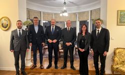 Bakan Ataoğlu, Polonya ziyaretinde Büyükelçi Denktaş'ı makamında ziyaret etti