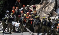 İran'ın misillemesinin ardından, Hayfa'da enkaz altında kalan 4 kişinin cesedine ulaşıldı